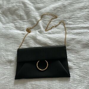 BNWOT black shoulder bag with gold details